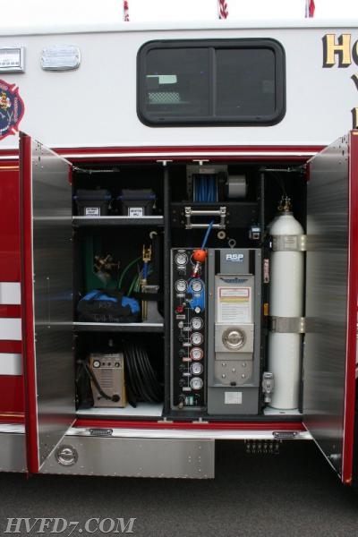Air Compartment, with Air tool boxes, Plasma Cutter, Petrogen and Oxy-Acetylene torch, Pak Hammer 90, and Cascade System.