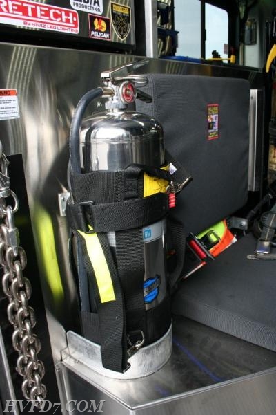 2 gallon Water Extinguisher sits at the rear of the bench for easy use and quick access.
